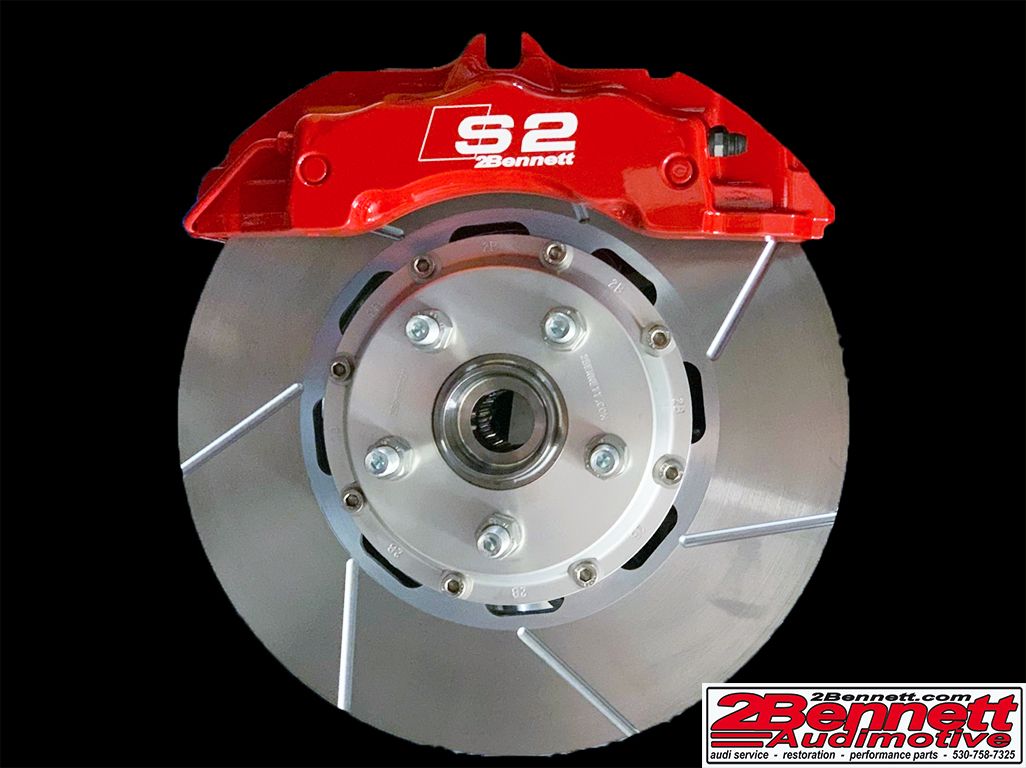 Six piston big brake caliper and rotor on an Audi