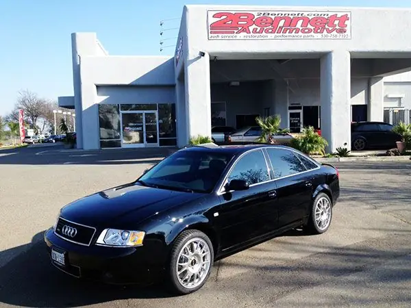 Black 2001 Audi A6 2.7T outside the 2Bennett building